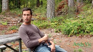 Cumming in a Park Along a Freeway With Traffic