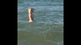 Naked Milf Swims In The Sea In Front Of Everyone