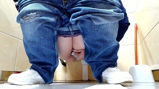 Hot Milf In Jeans Pissing In A Public Restroom