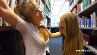 Two Horny Schoolgirl Fingering Pussies In Library