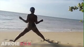 Ebony Woman Doing Some Exercise Naked On The Beach