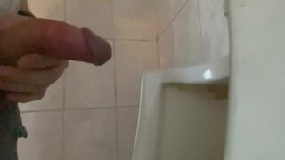 Pissing With A Big Dick With Big Balls In A Public Toilet In A Urinal