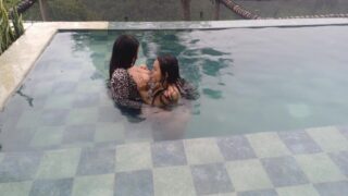 Playing In The Pool And Sucking Her Tits