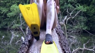 Posing Over Forest Lake With Fins In Bikini