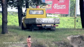Ola walking alone naked on a public beach (voyeur version)