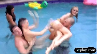 Hotties Get Fucked and Suck Guys in Pool Orgy