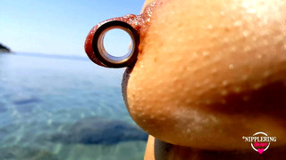nippleringlover – horny milf pissing on the nude beach, pierced pussy, wide open, huge pierced nipples