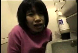 Asian Girl Masturbates in Airplane Bathroom