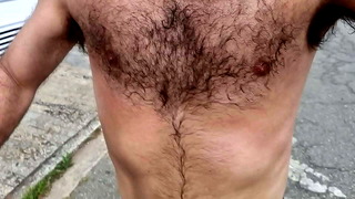 Naughty hairy guy training outdoors