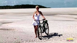 Passionate fucking on the beach with a stunning blonde with big tits