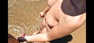 Dickflash on a nudist beach I approach a stranger and she is masturbating, touching my dick