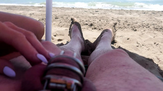 teasing in chastity on the beach