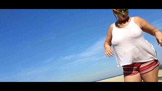 Big breasts on the beach