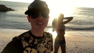 Aiden and astronaut lady at the beach